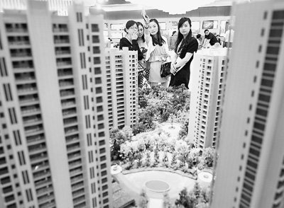 人民日报:不能指望房产税成降房价利器